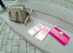  女子如厕遗失2万元现金 保洁阿姨苦等1小时找失主